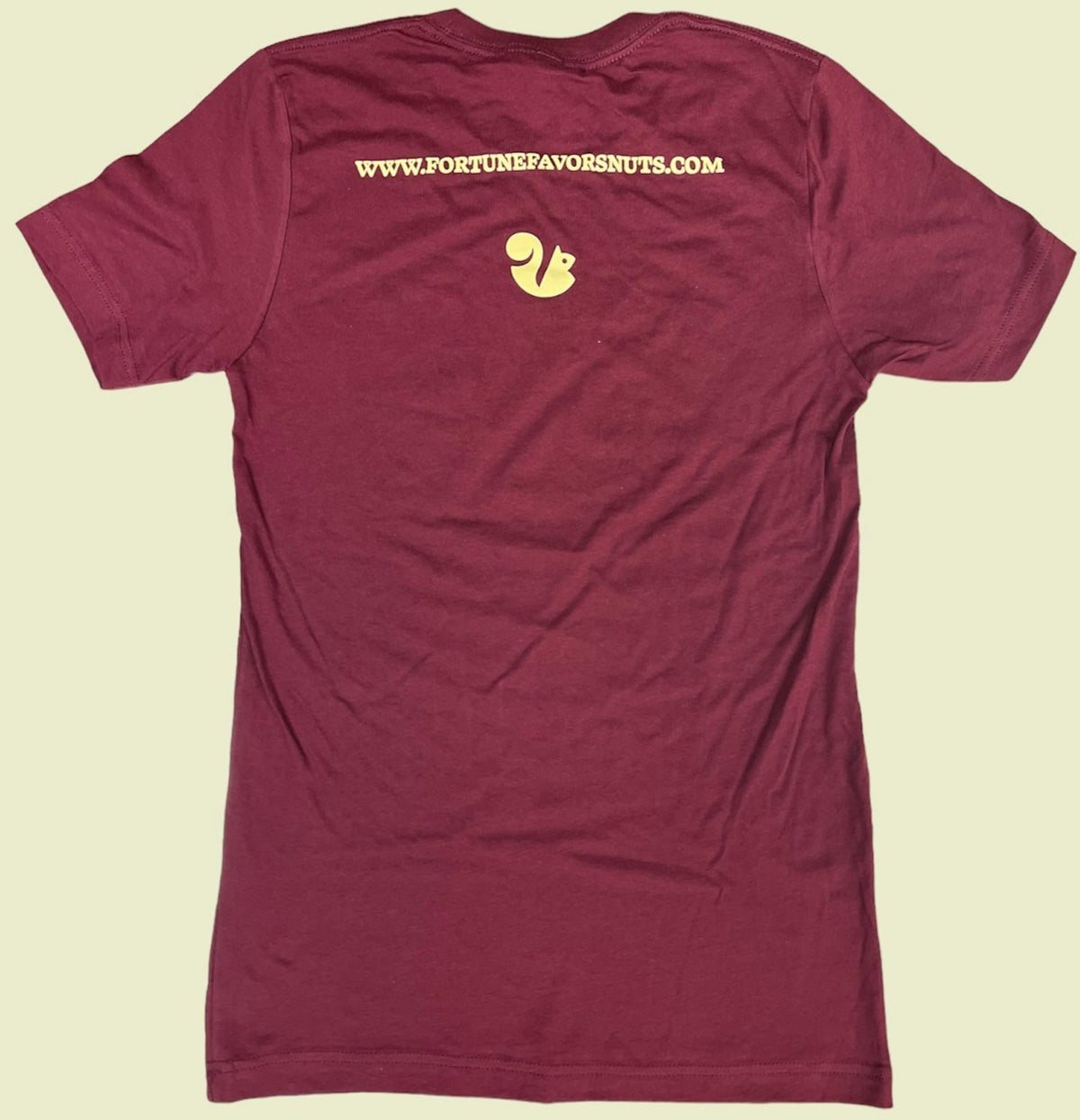 Back of Burgundy Tee with www.fortunefavorsnuts.com logo and squirrel icon
